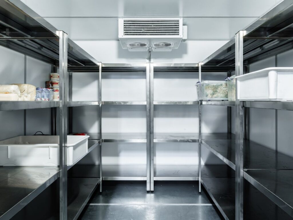 Coolroom with stainless steel shelving and lined walls