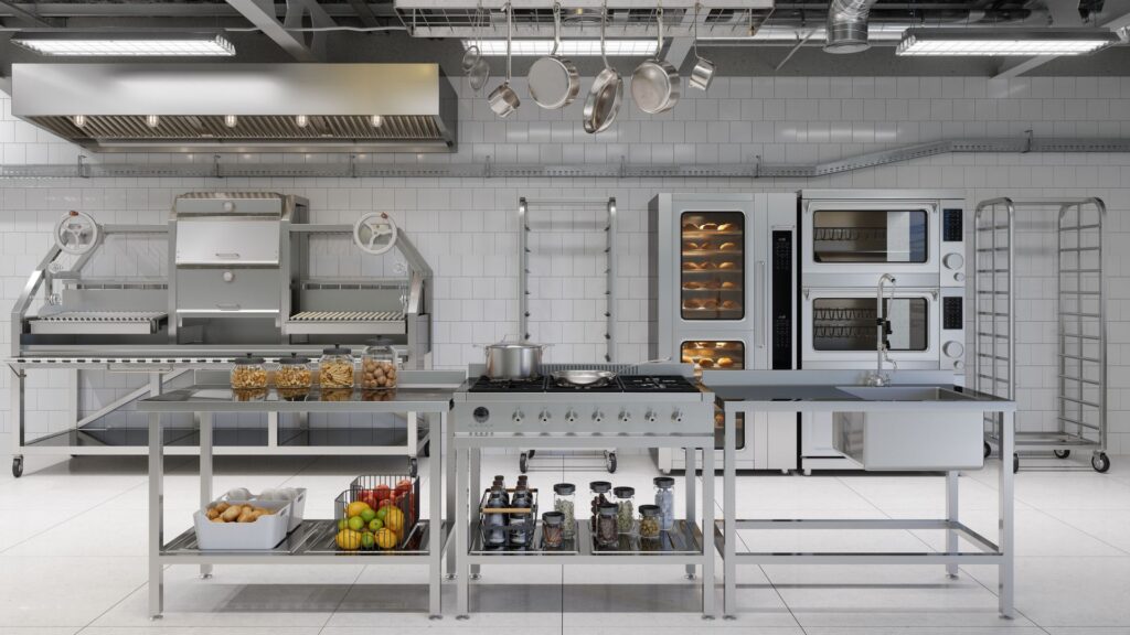 Commercial kitchen fitted with stainless steel prep benches and undershelves
